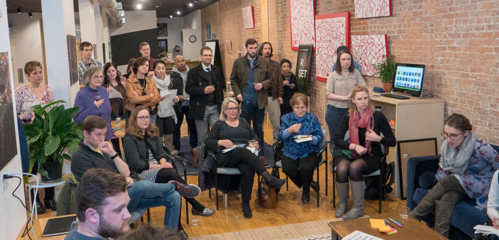 People gathered at a R3SET workshop
